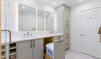 Clean modern bathroom vanity with double sinks and ample storage space.