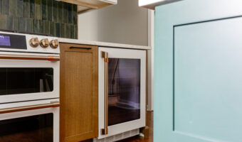 Modern kitchen with custom cabinetry and appliances, showcasing a stylish and functional space for h.