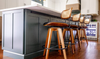 Modern kitchen island with bar stools in a contemporary home renovation.