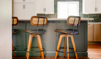 Modern kitchen island with bar stools in a contemporary home renovation.